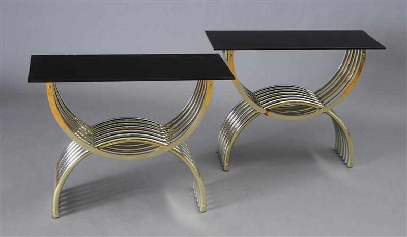 Appraisal: PAIR OF CHROME AND BRASS CURULE-FORM CONSOLE TABLES With glass