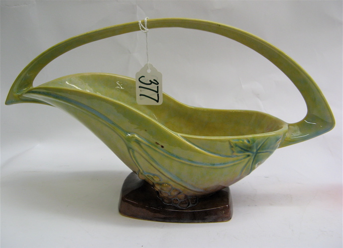 Appraisal: ROSEVILLE GLAZED ART POTTERY BASKET Wincraft pattern The modern design