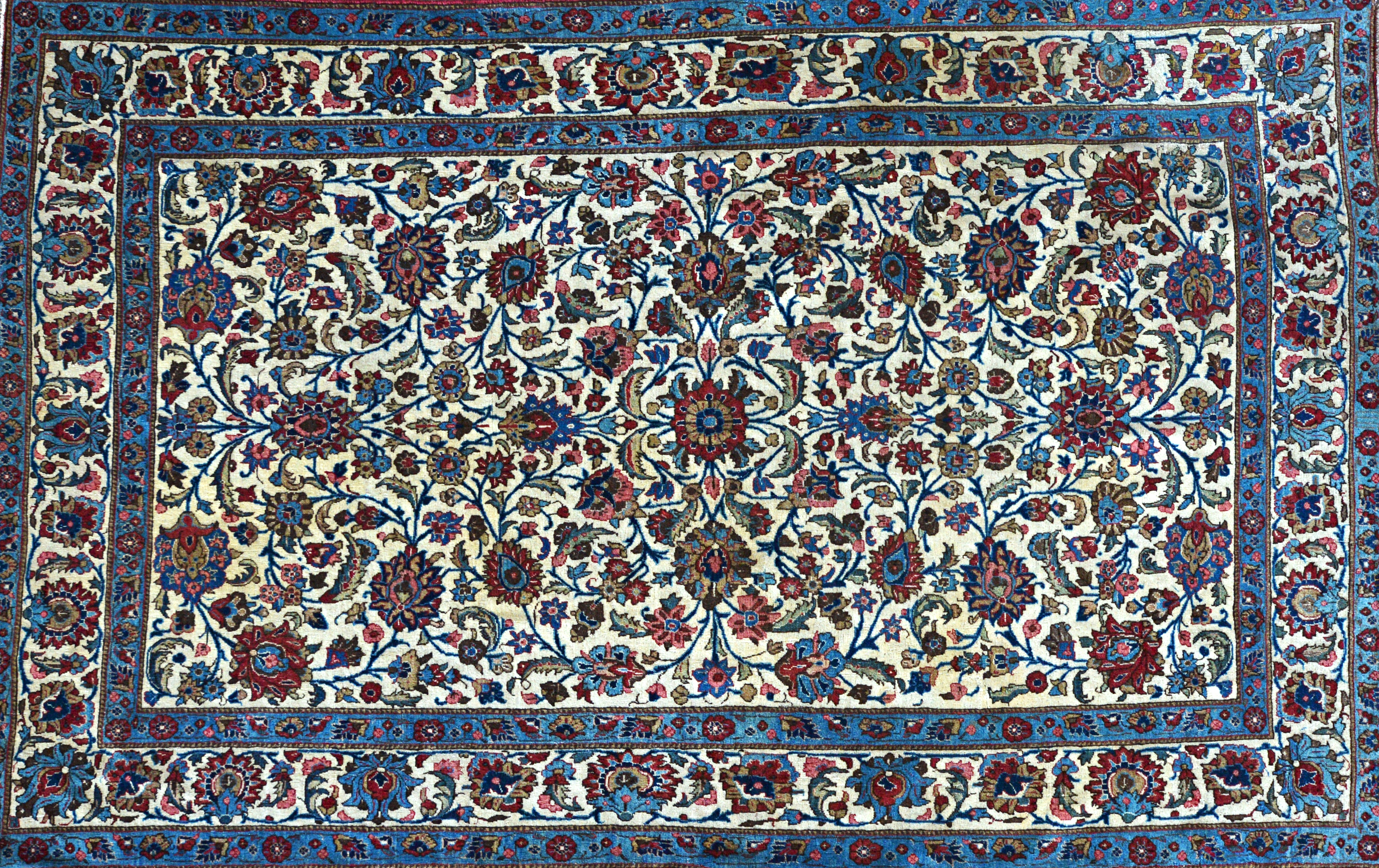 Appraisal: An Esfahan rug Persian the ivory field with an allover