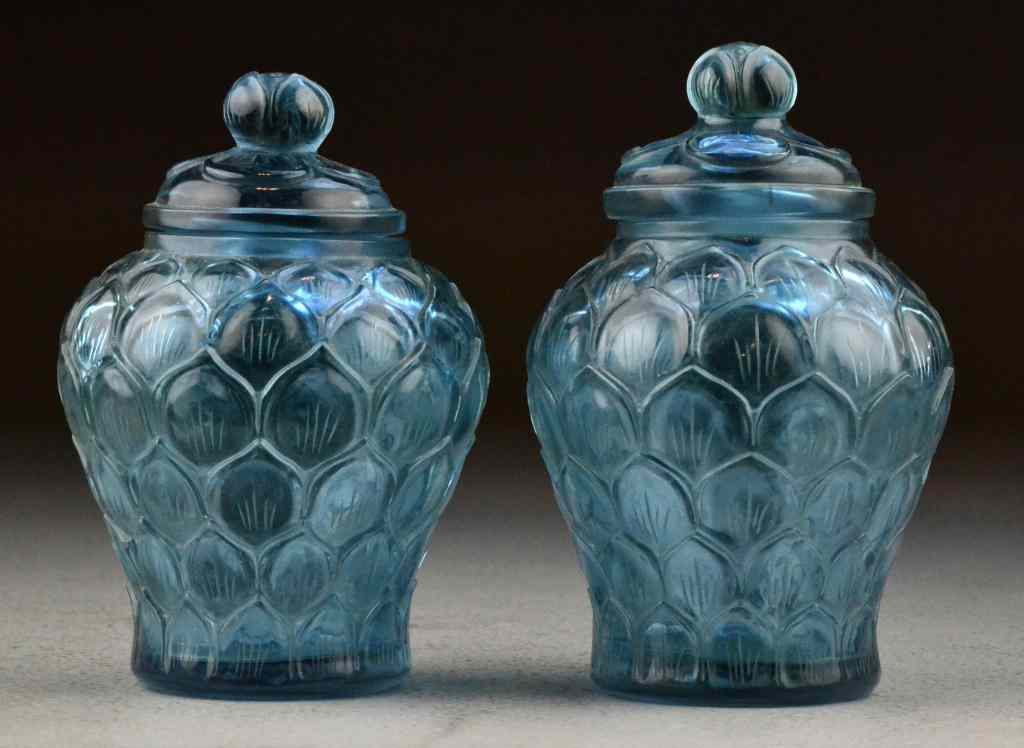 Appraisal: Pr Chinese Peking Glass JarsFinely molded with lotus petal design