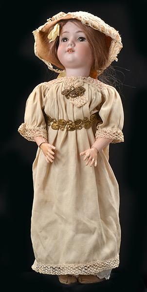 Appraisal: AN ARMAND MARSEILLE AM BISQUE AND COMPOSITION DOLL CIRCA eyelashes