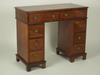 Appraisal: DESK - Circa diminutive three part mahogany double bank desk