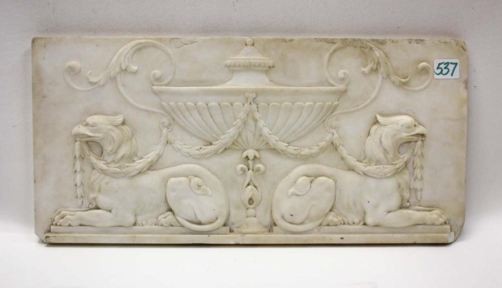 Appraisal: CLASSICAL STYLE MARBLE PLAQUE of rectangular form with relief urn