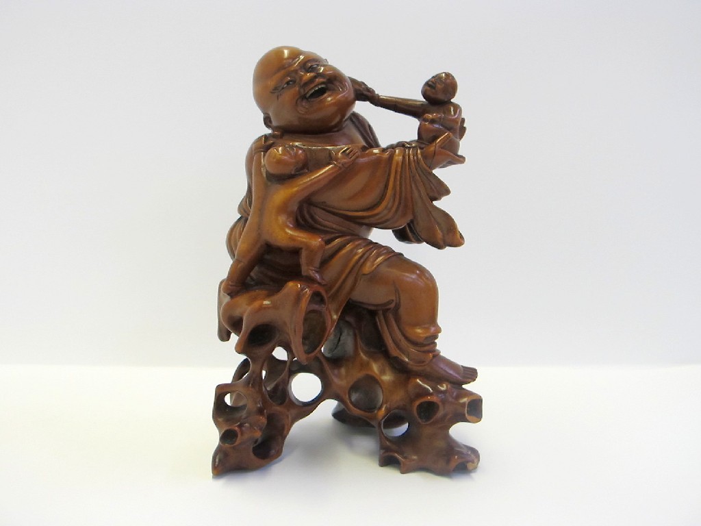 Appraisal: Chinese carved wooden figure of a Buddha and children