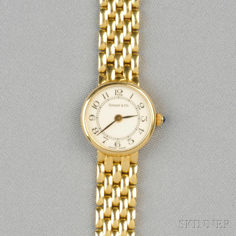 Appraisal: kt Gold Wristwatch Tiffany Co the white dial with Arabic