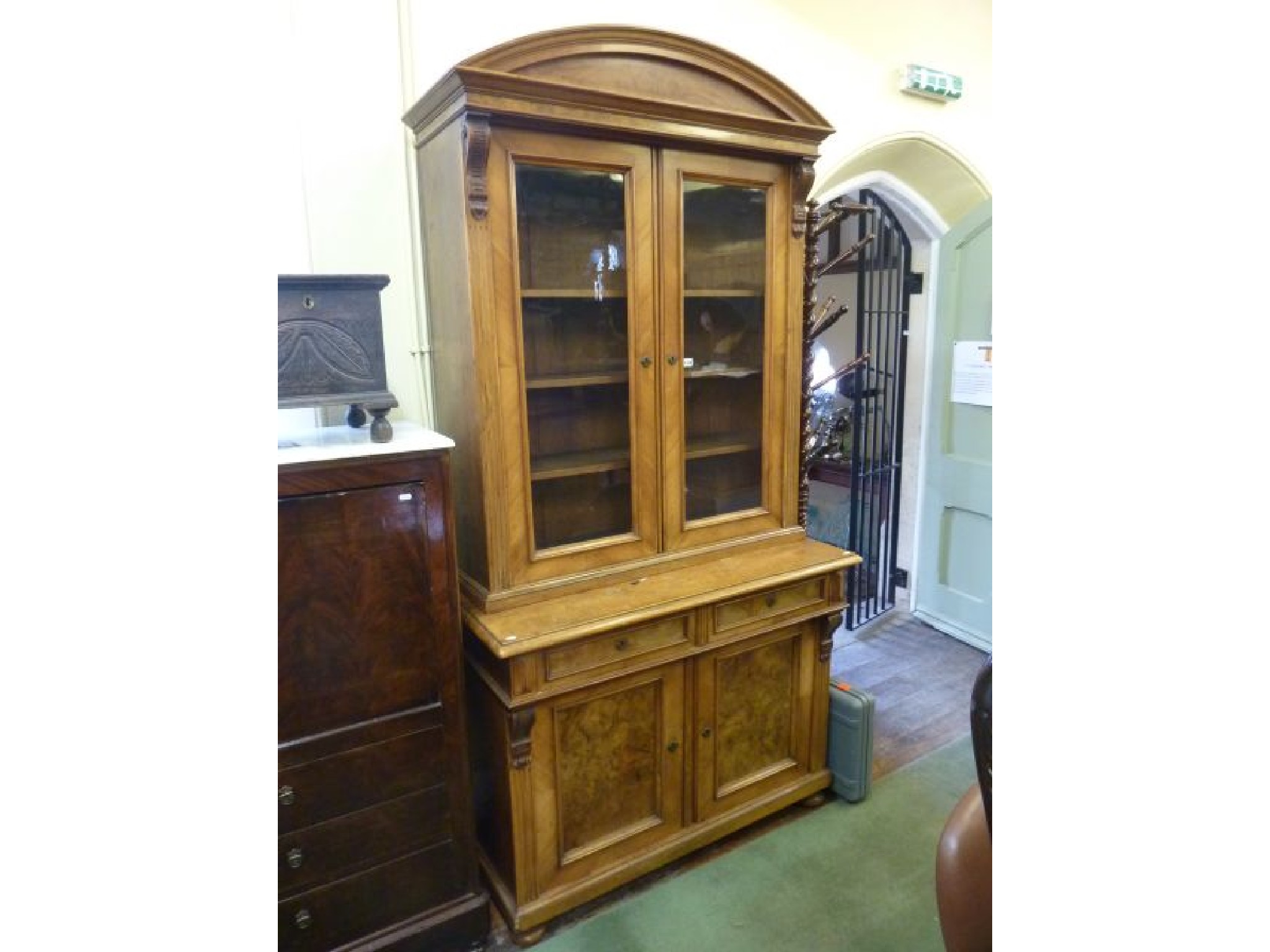 Appraisal: A mid- th century continental walnut and figured walnut library