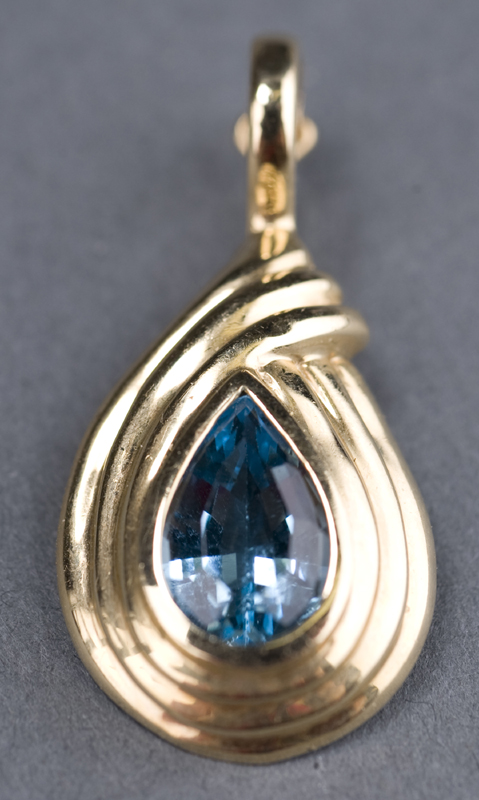 Appraisal: kt yellow gold blue topaz and pearl enhancer pendant Containing