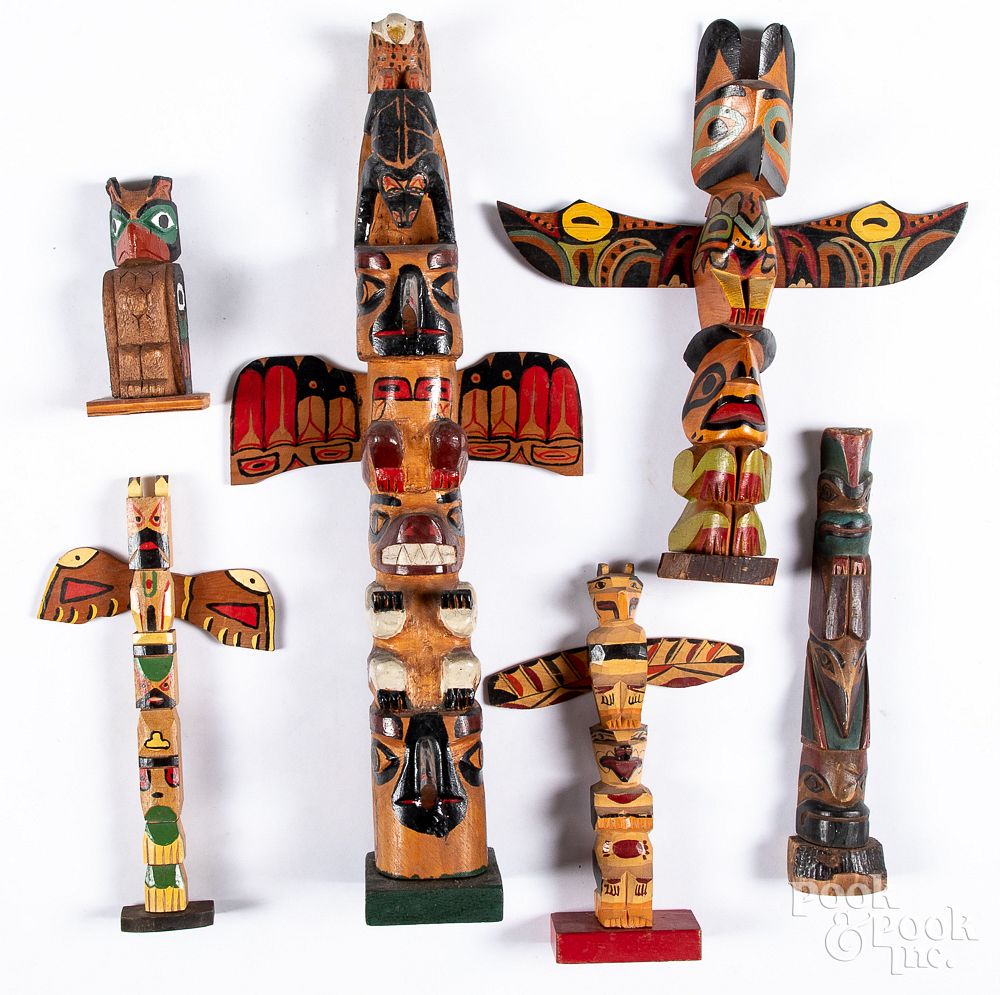 Appraisal: Six vintage northwest coast totem poles Six vintage northwest coast