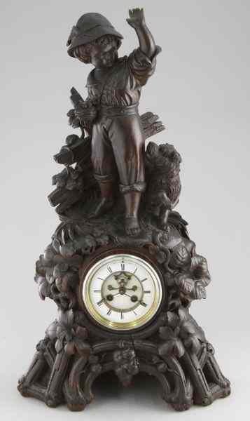 Appraisal: C V Bergen Swiss Black Forest carved mantel clockhaving a