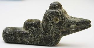 Appraisal: carved steatite animal effigy pipe length carved steatite animal effigy