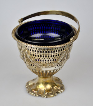 Appraisal: A Victorian pierced silver ovoid bonbon basket with swing handle