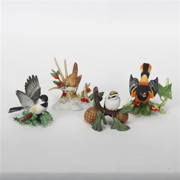 Appraisal: Four Lenox porcelain bird figurines Including Chickadee Baltimore Oriole Marsh