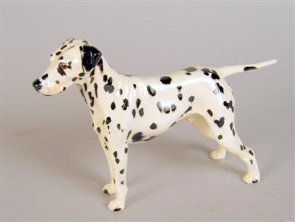 Appraisal: Royal Doulton porcelain figure of a dog th century Modeled