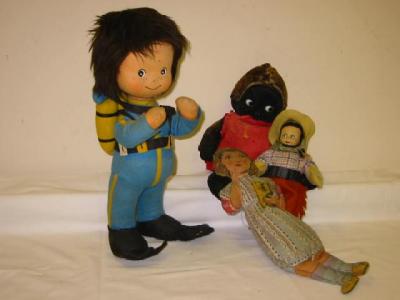 Appraisal: A Scuba diving doll felt covered with painted face black