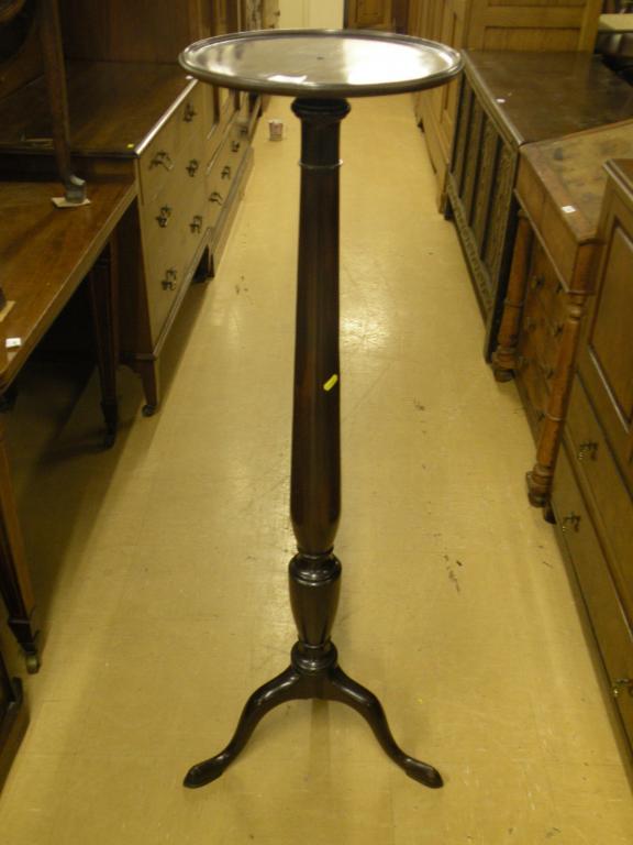 Appraisal: A mahogany torchere