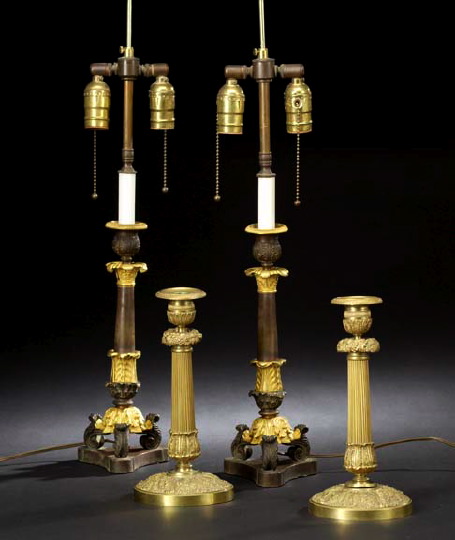 Appraisal: Pair of French Gilt-Bronze and -Brass Tripodal Candlesticks in the