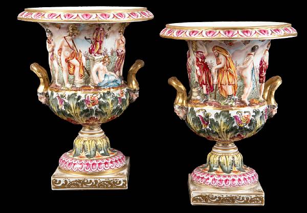 Appraisal: A pair of Capodimonte porcelain campana form urns height in