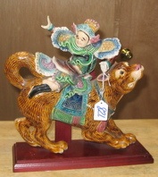 Appraisal: A CHINESE GLAZED EARTHENWARE FIGURAL ROOF TILE WALL MOUNT a