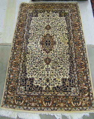 Appraisal: INDO-PERSIAN AREA RUG floral and central floral medallion design on