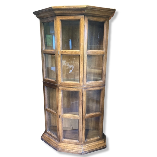 Appraisal: A glazed glass Display cabinet With two opening doors and