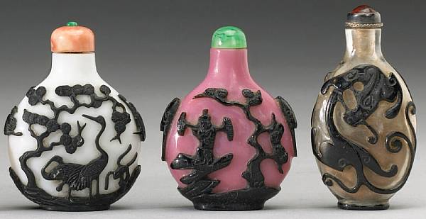 Appraisal: Four black overlay glass snuff bottles The first of opaque