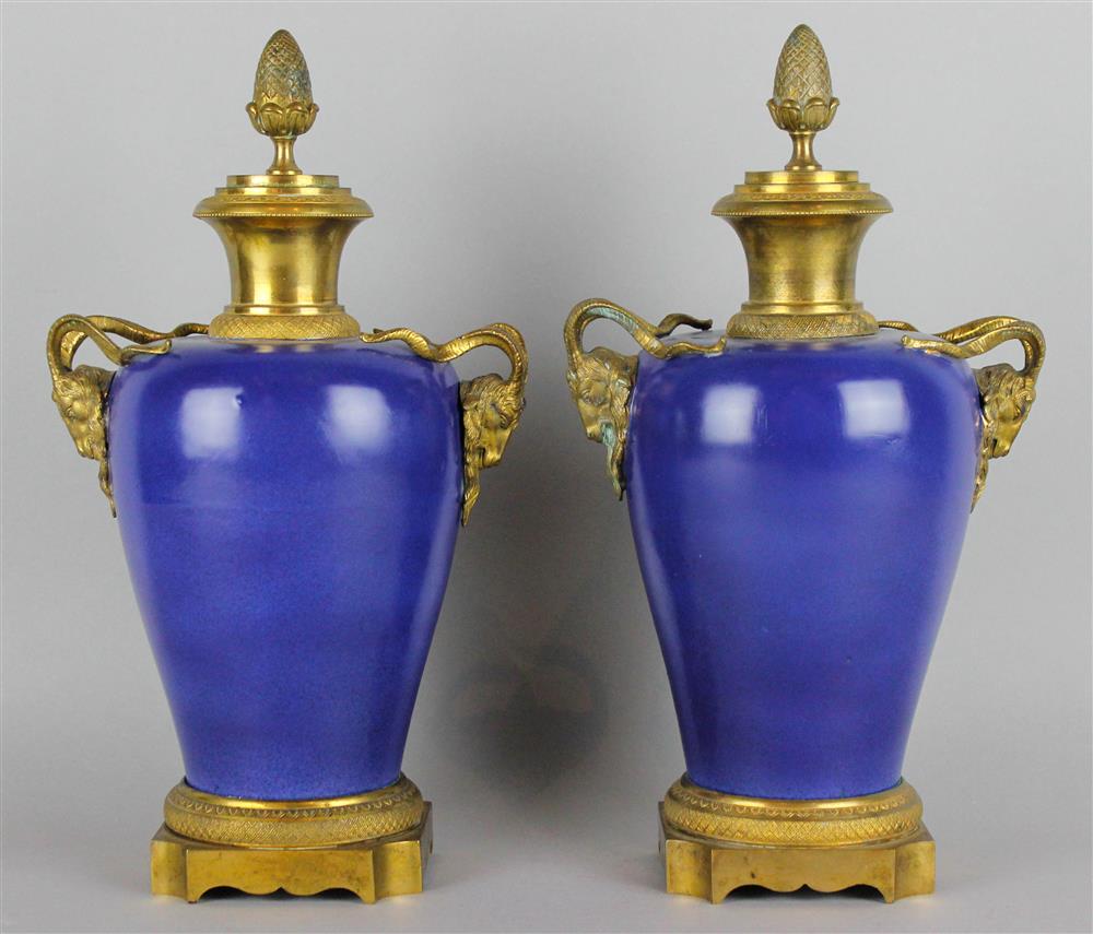 Appraisal: PAIR OF CHINESE DARK BLUE-GLAZED ORMOLU MOUNTED VASES Kangxi six-character