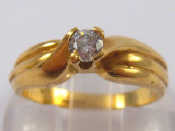 Appraisal: A yellow metal tests carat gold cubic zirconia ring size