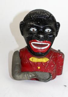 Appraisal: Vintage Jolly Negro aluminum mechanical bank Vintage American Jolly Negro