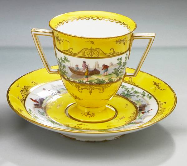 Appraisal: A Paris porcelain two handled cup and saucer th century