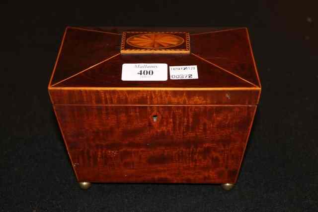 Appraisal: A GEORGIAN MAHOGANY TEA CADDY of sarcophagus shaped form with