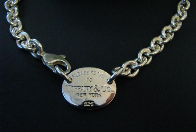 Appraisal: Tiffany sterling necklace with ''Please Return to Tiffany Co New