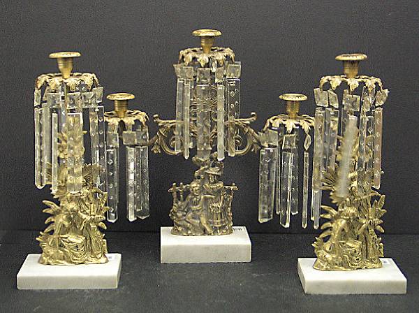 Appraisal: An American brass marble and glass assembled three piece garniture