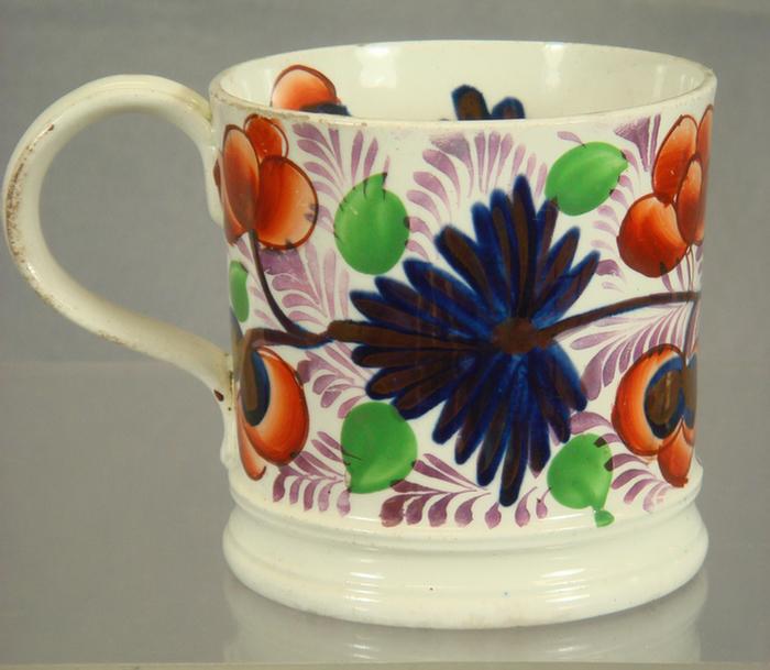 Appraisal: Gaudy Welsh handled mug grape pattern h molded strap handle