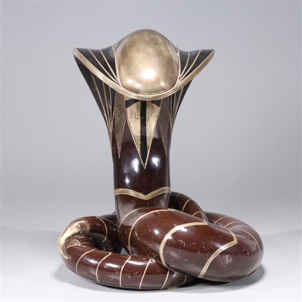 Appraisal: Large possibly wood and metal cobra statue with allover detail