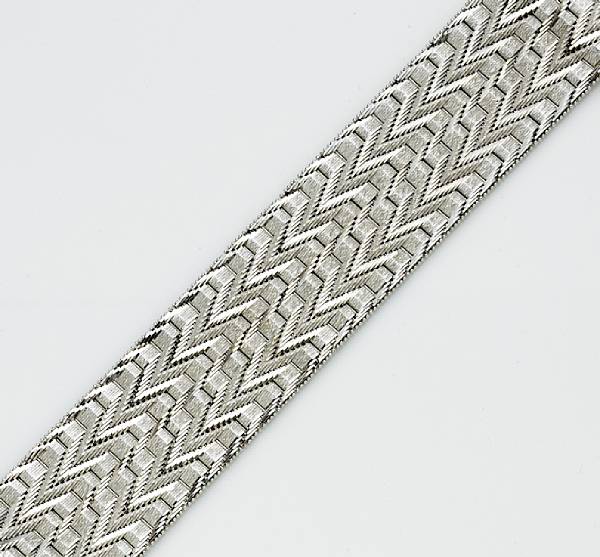 Appraisal: A fourteen karat white gold flexible bracelet weighing approximately grams