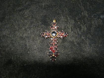 Appraisal: karat yellow gold and garnet crossL in