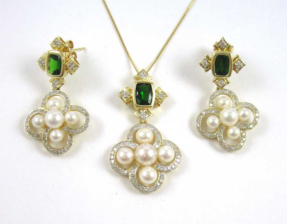 Appraisal: PEARL AND TSAVORITE NECKLACE AND EARRINGS SET The pendant necklace