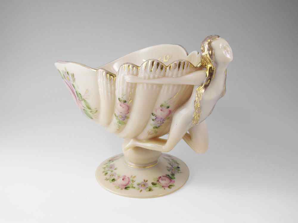 Appraisal: CAMBRIDGE CROWN TUSCAN FLYING NUDE CONSOLE BOWL Hand painted Charleton