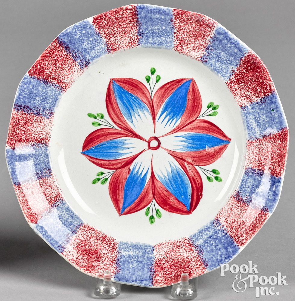 Appraisal: Red and blue rainbow spatter Dahlia plate th c Red