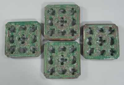 Appraisal: A Set of Four Glazed Ceramic Chinese Window Tiles Each