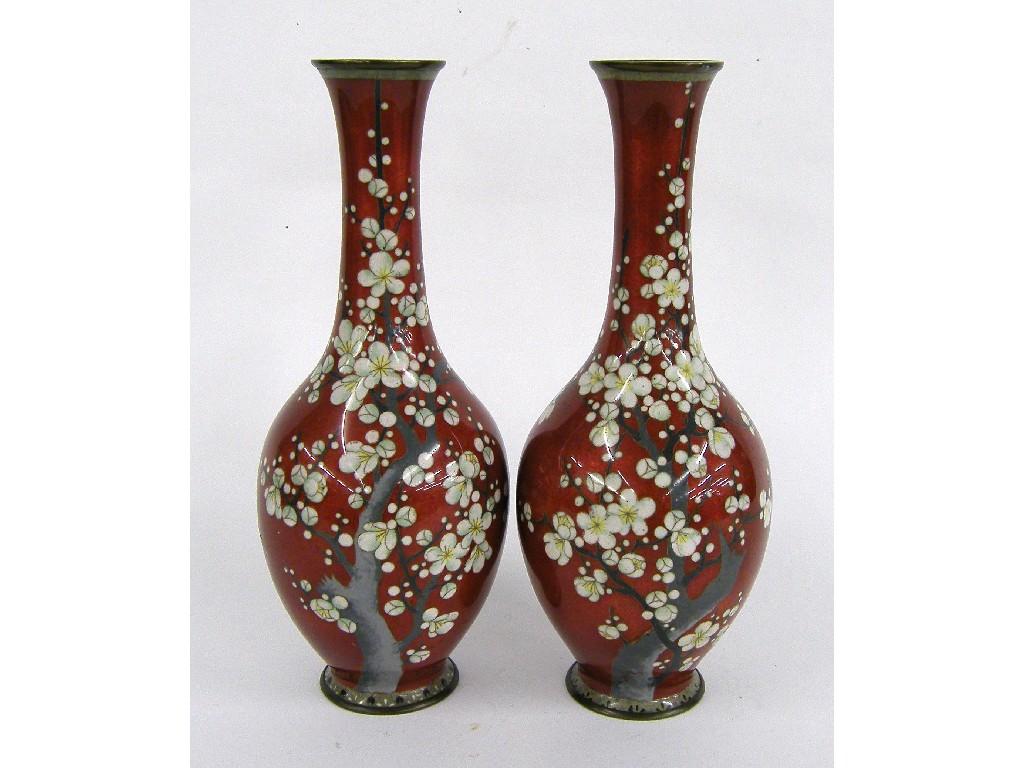 Appraisal: Pair of Japanese cloisonne bottle vases decorated with prunus blossom