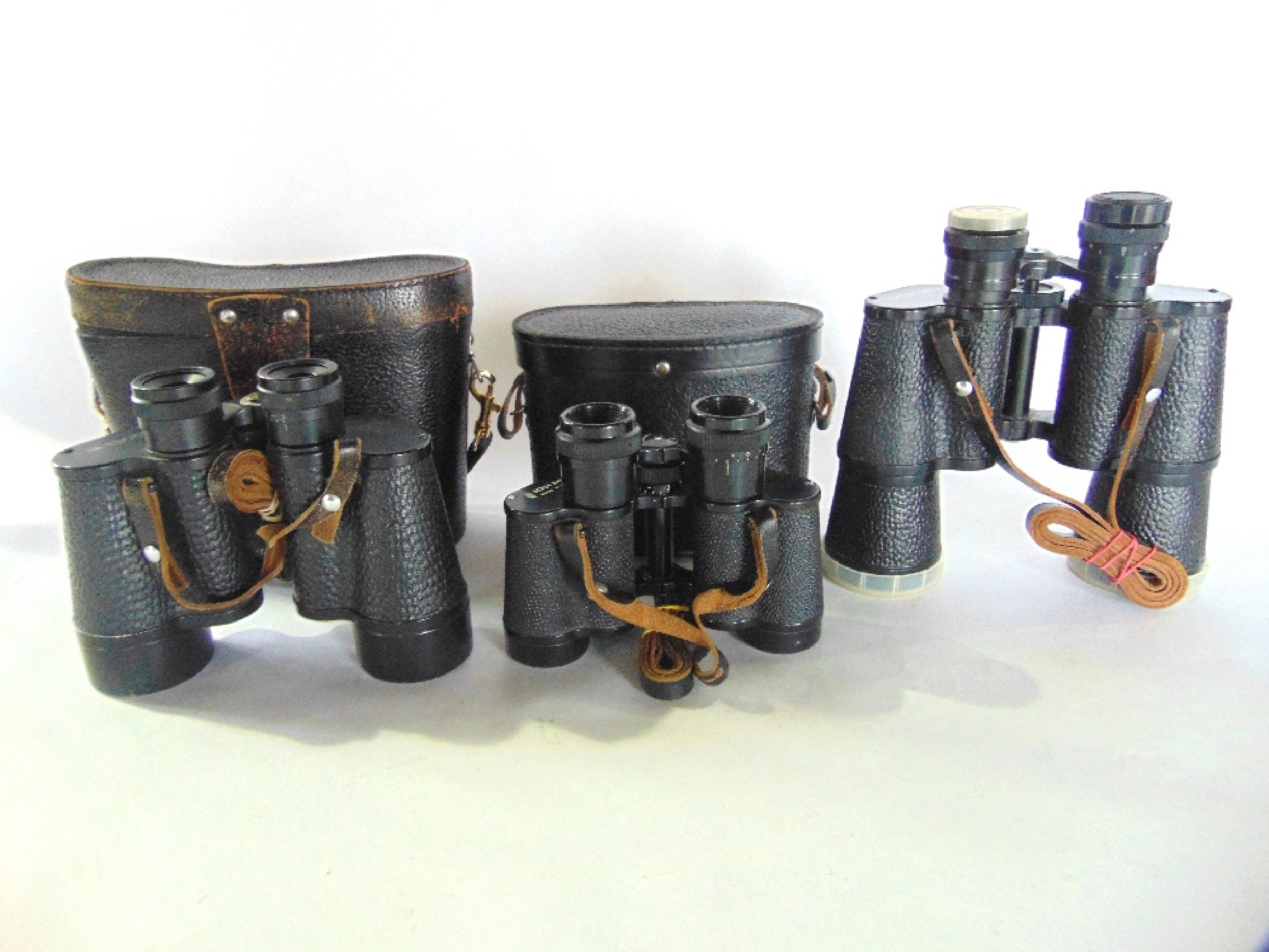 Appraisal: Three good quality pairs of th century Russian binoculars to