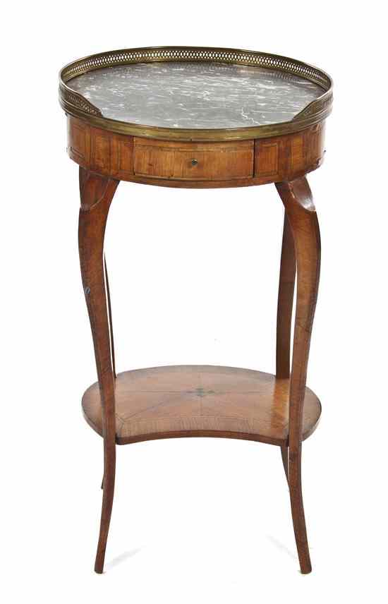 Appraisal: A Louis XV Transitional Fruitwood Occasional Table having a galleried