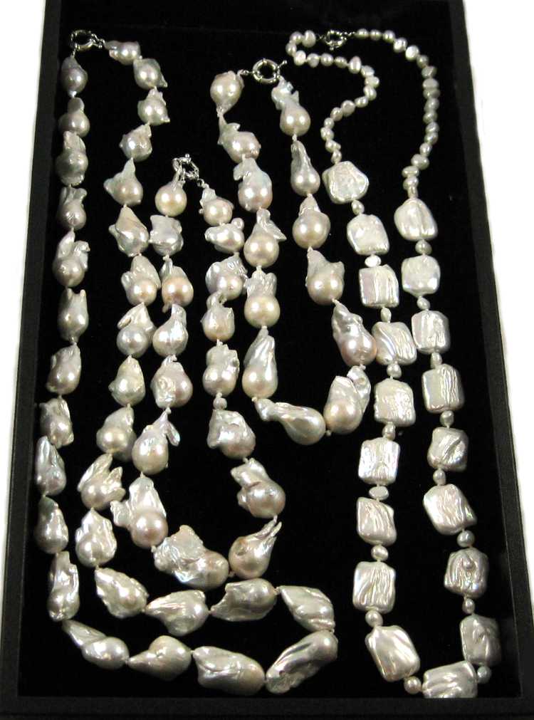 Appraisal: FOUR BAROQUE WHITE PEARL NECKLACES including an - necklace strung