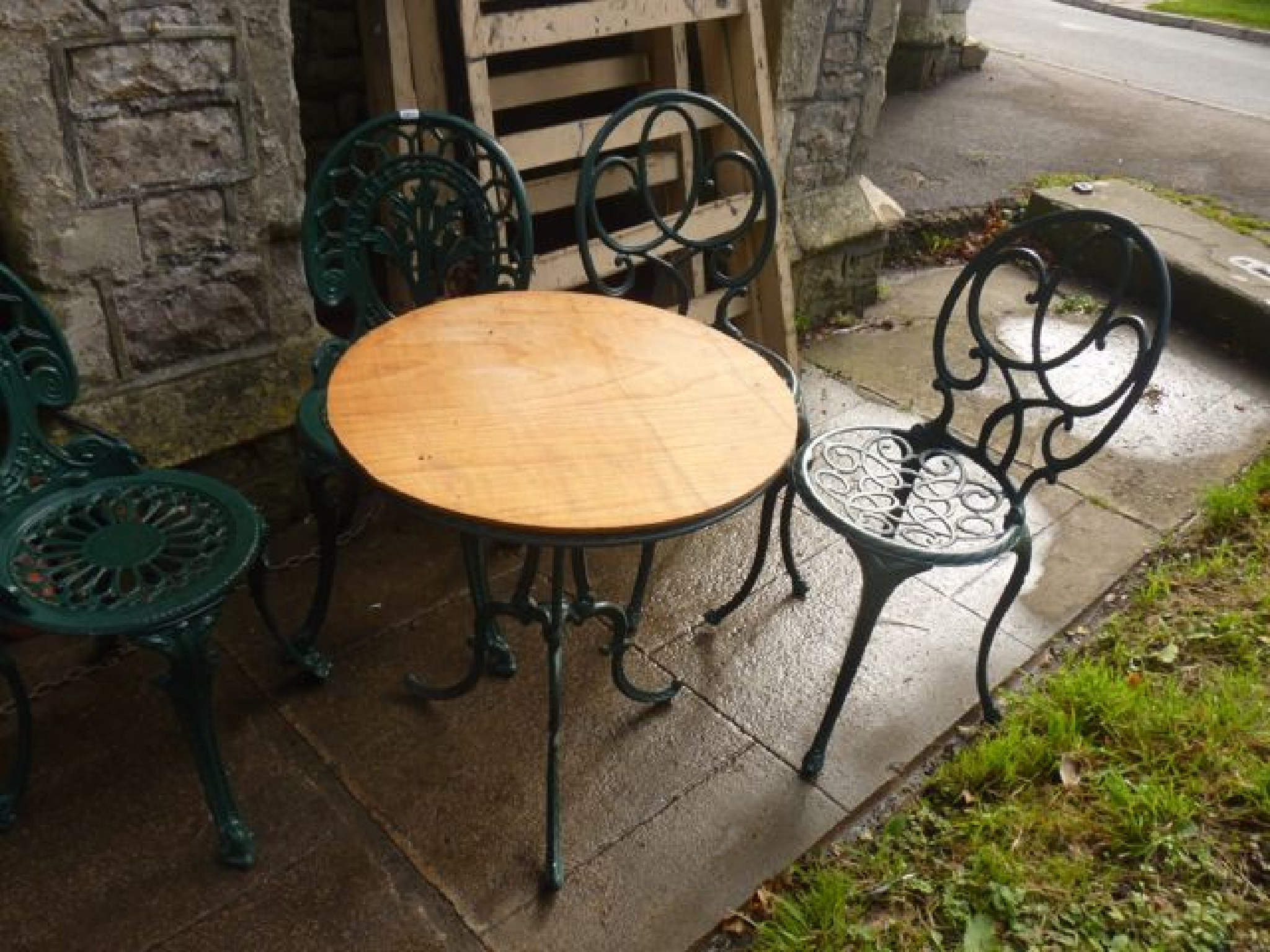 Appraisal: A small cast aluminium garden terrace table of circular form