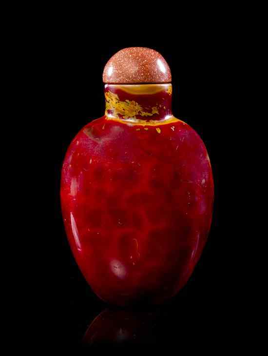 Appraisal: A Simulated Realgar-Glass Snuff Bottle of ovoid form with spotted