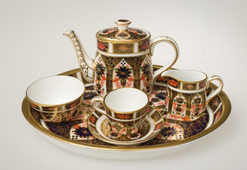 Appraisal: ROYAL CROWN DERBY SOLITAIRE MINIATURE TEA SERVICE painted and gilt