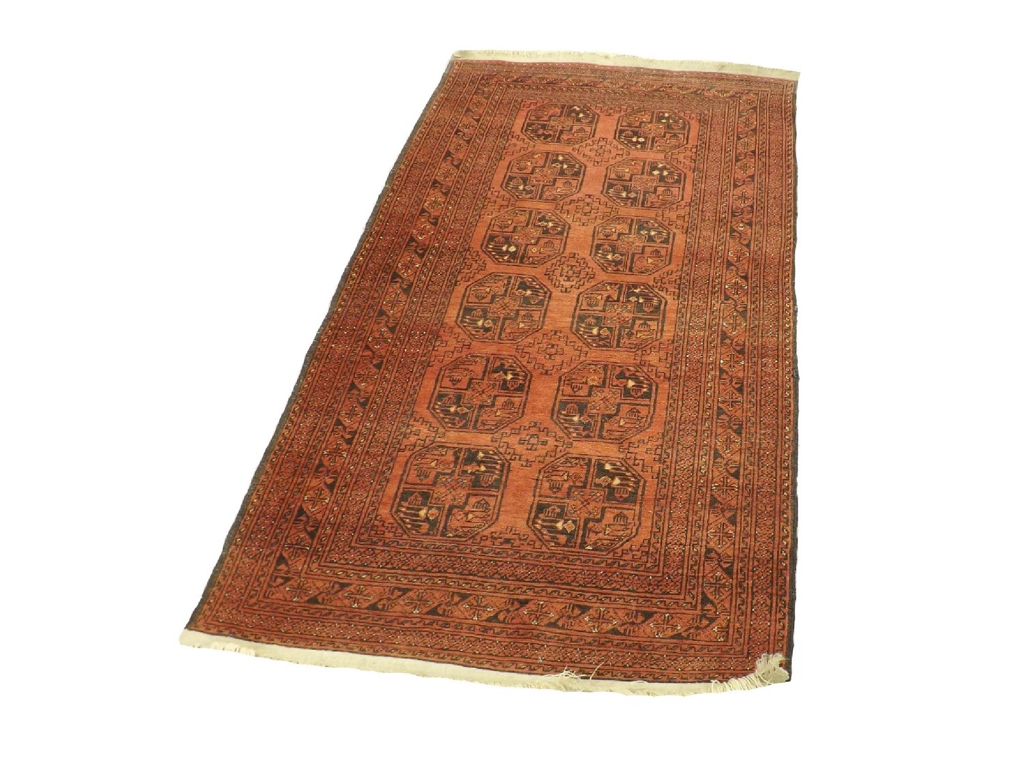 Appraisal: Bokhara rug decorated with various geometric medallions upon a red