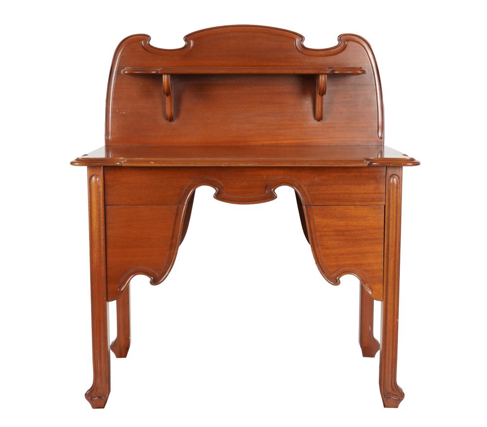 Appraisal: ART NOUVEAU MAHOGANY WRITING TABLEhaving three drawers Provenance The Estate