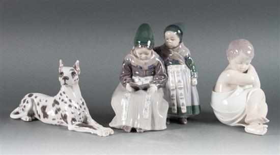 Appraisal: Three Royal Copenhagen porcelain figures and figure groups two children